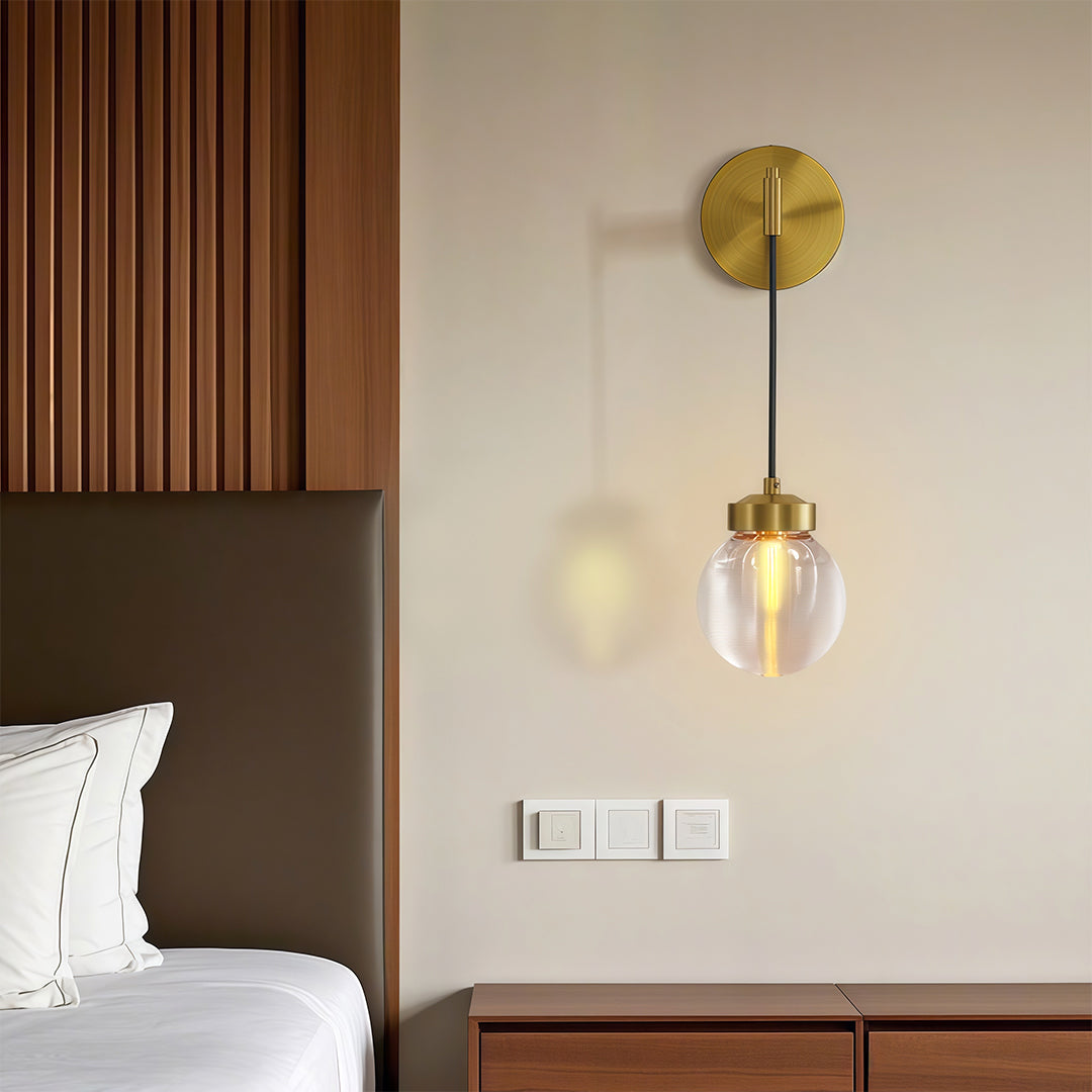 Modern luxury chandeliers illuminating minimalist bedroom with wood slat accent wall