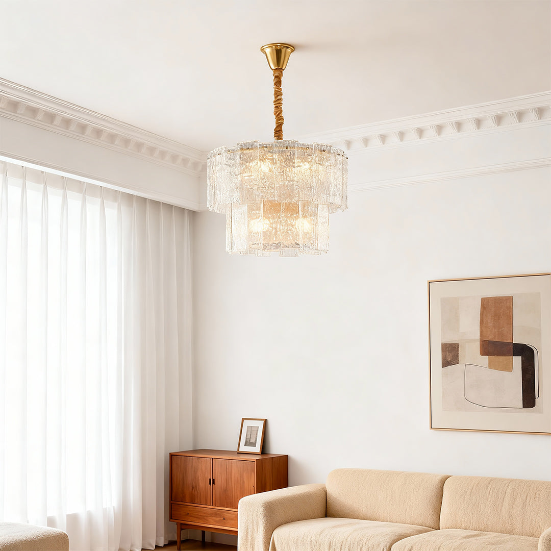 Small modern chandeliers enhancing serene bedroom with beige upholstered bed and sheer curtains