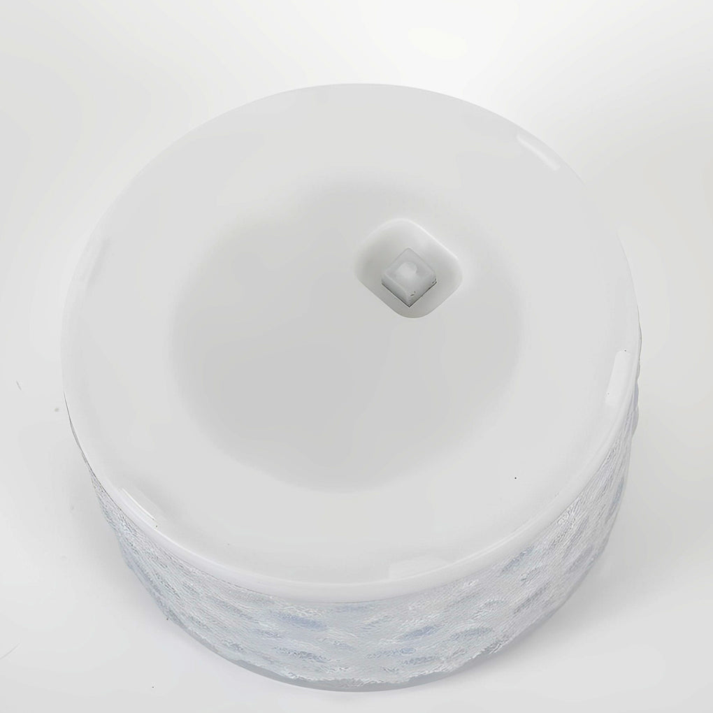 Bottom view of small step light showing flat base and integrated switch design.