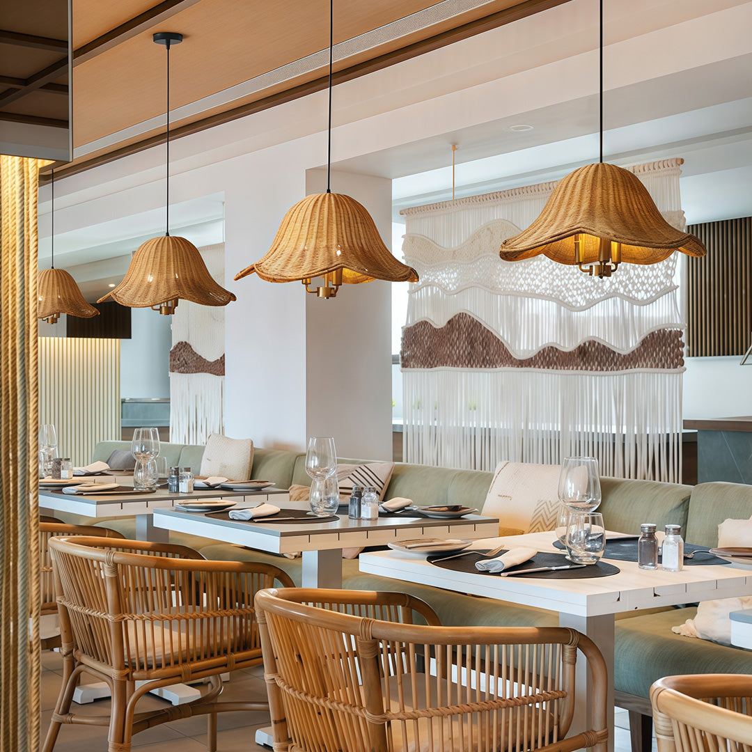 Hanging rattan pendant light with a soft, ambient glow, perfect for illuminating dining and living areas.