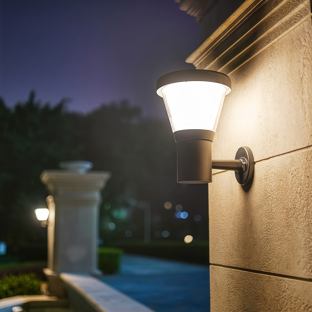Solar-powered black outdoor wall mount light providing energy-efficient lighting for the garden fence.