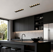 Solar ice cube lights illuminating a garden pathway edge at night.