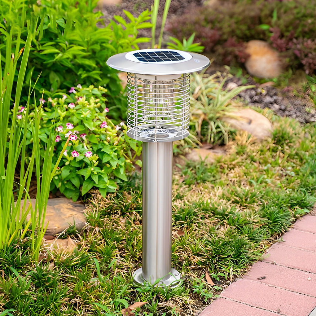 Solar powered insect zapper light installed beside pathway for outdoor pest control.