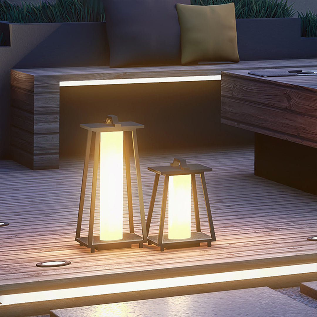 Elegant solar lanterns positioned on modern patio steps providing sophisticated pathway lighting