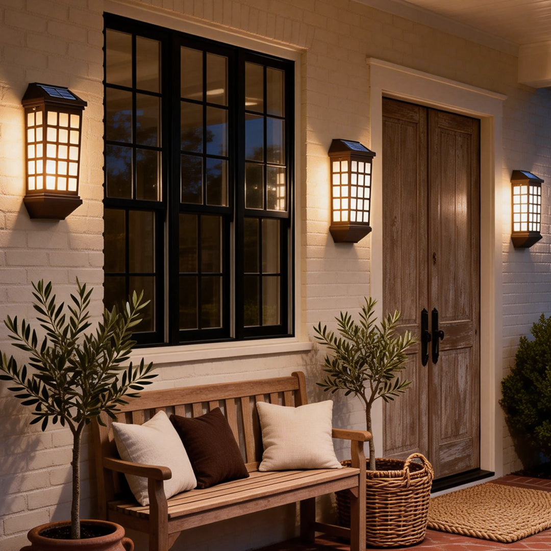 Solar light outdoor wall installed along an exterior entryway, creating classic architectural accent lighting.