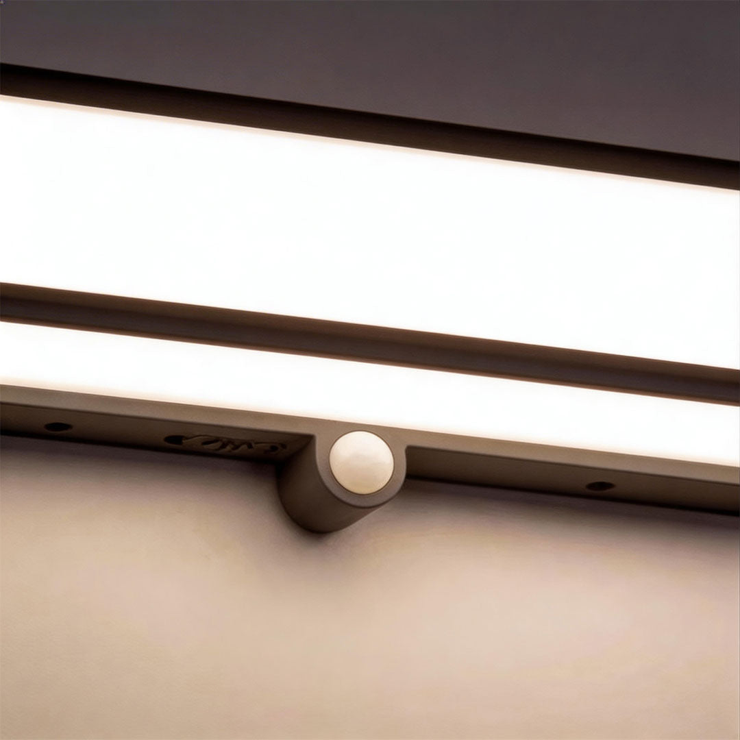 Close-up of solar light outdoor wall mount showcasing its sleek design and warm light.