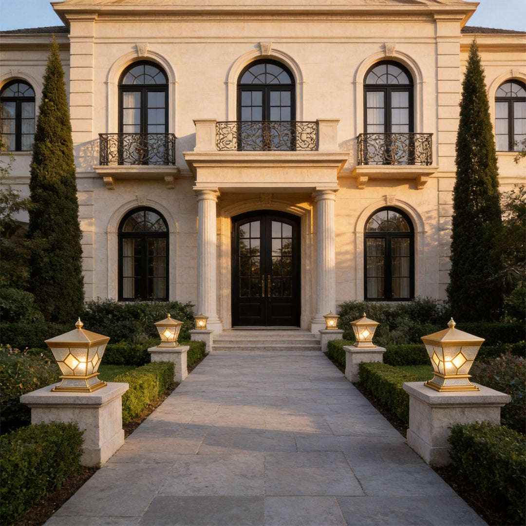 Solar lights outdoor gate pillar enhancing a luxury mansion driveway with warm exterior illumination.