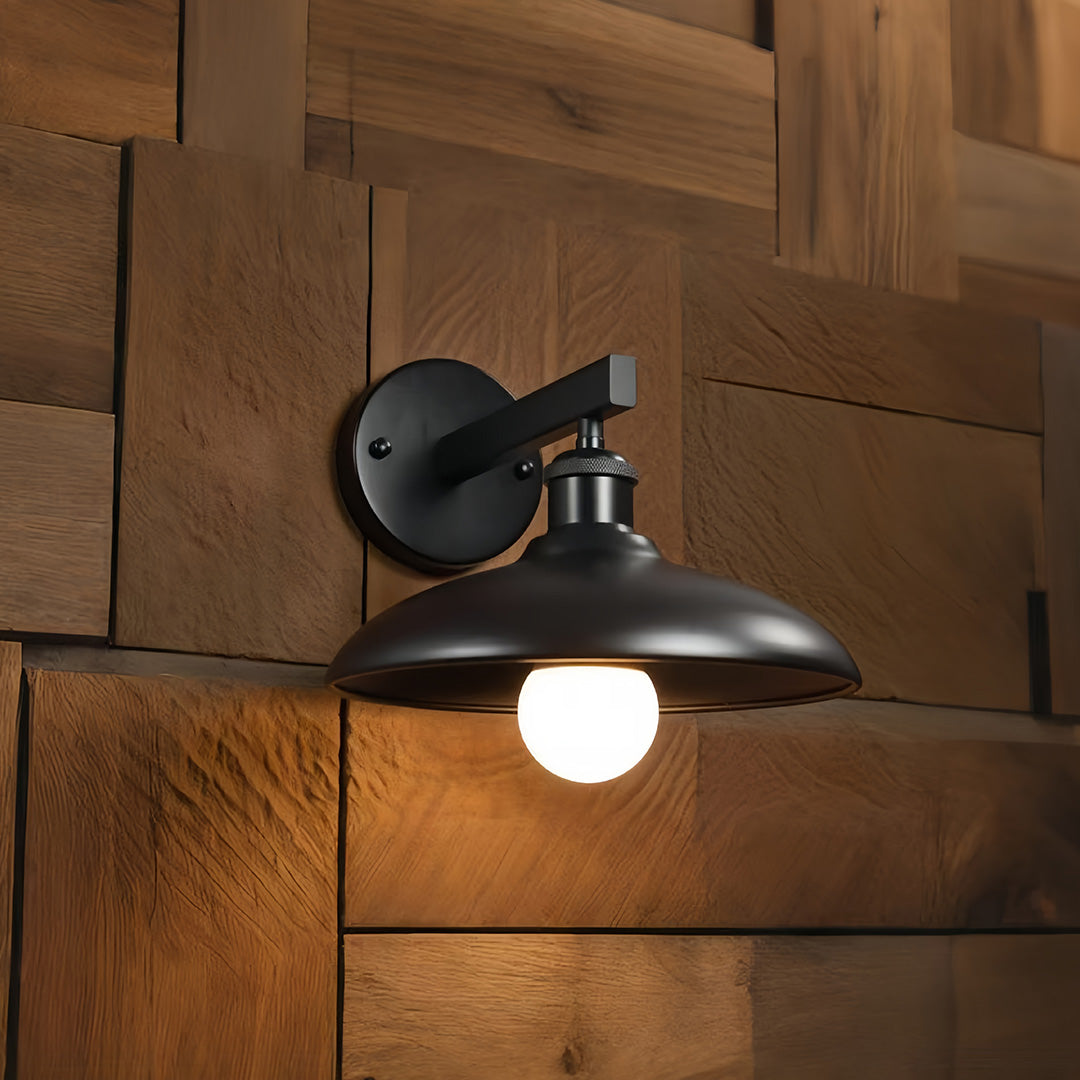 Black farmhouse-style solar lights outdoor wall lamp mounted on wooden siding.