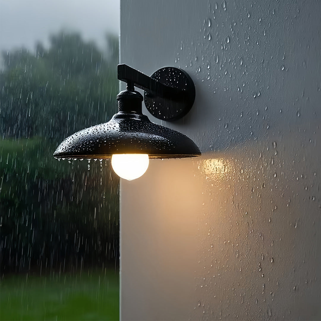 Rustic outdoor solar lights wall fixture installed on wooden exterior with warm illumination.