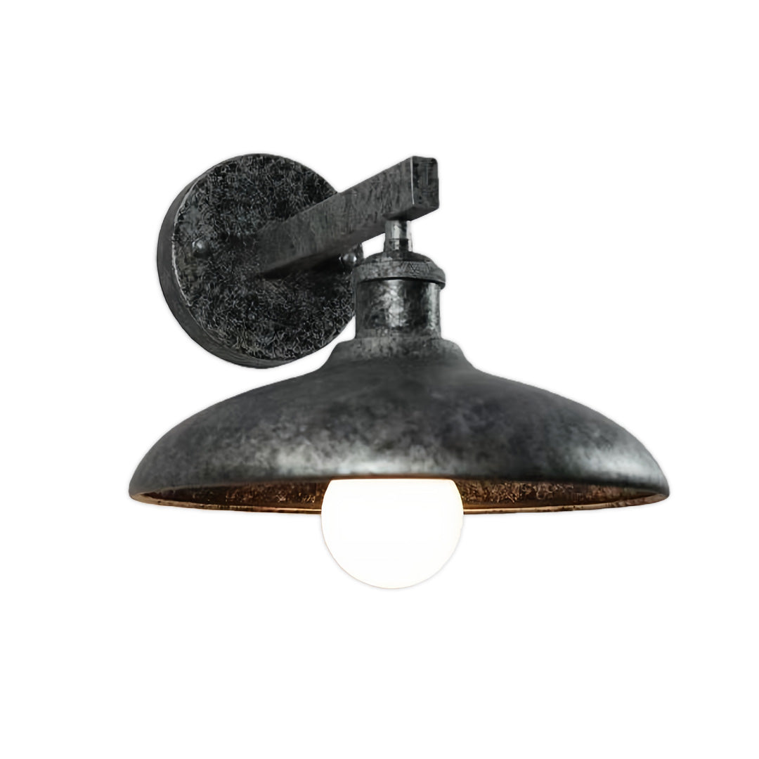 Rustic outdoor solar lights wall fixture installed on wooden exterior with warm illumination.