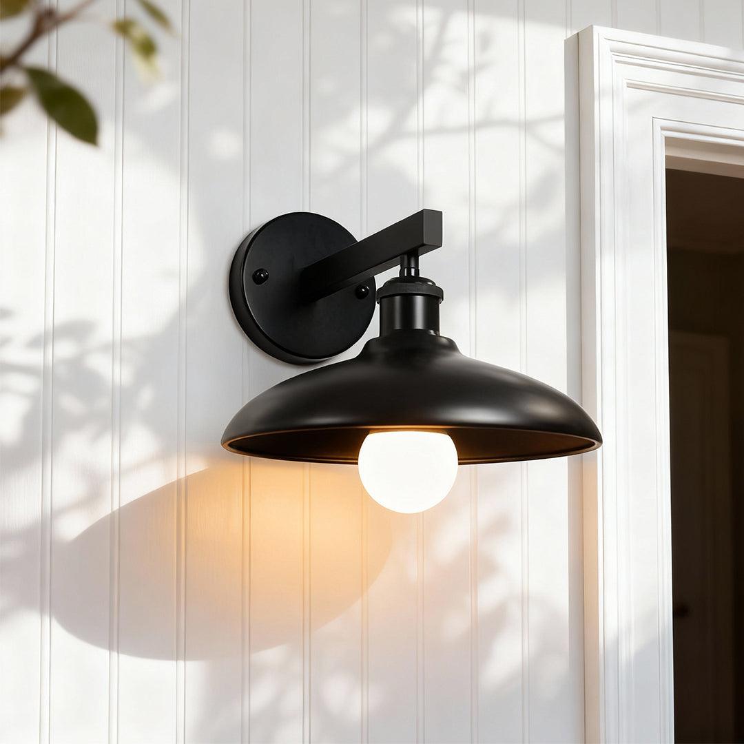 Rustic outdoor solar lights wall fixture installed on wooden exterior with warm illumination.