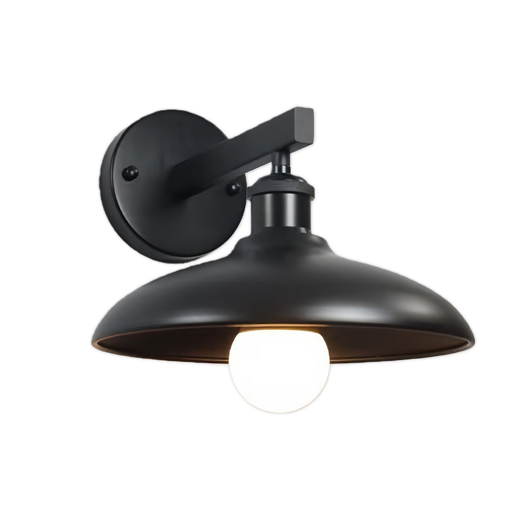 Weather-resistant bronze solar lights outdoor wall fixture illuminating exterior walls.