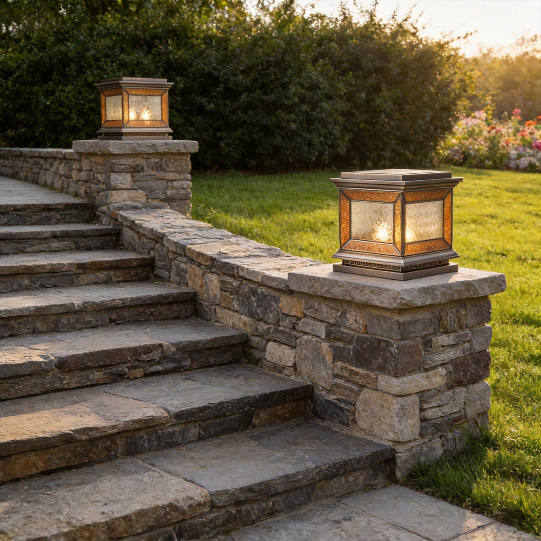 Premium solar lights pillar beside outdoor staircase and landscaped garden pathway at sunset.