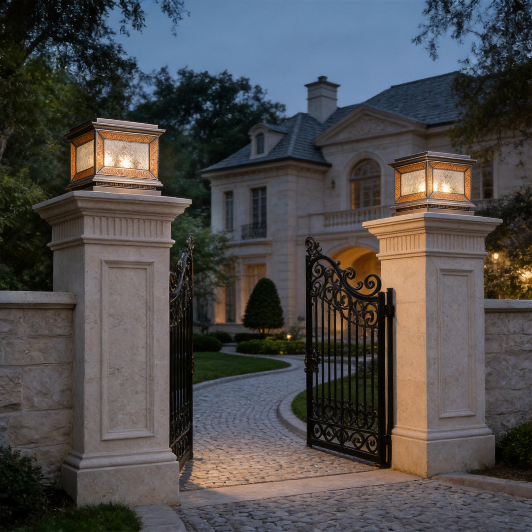 Luxury solar lights pillar installed on elegant mansion entrance columns with warm ambient glow.
