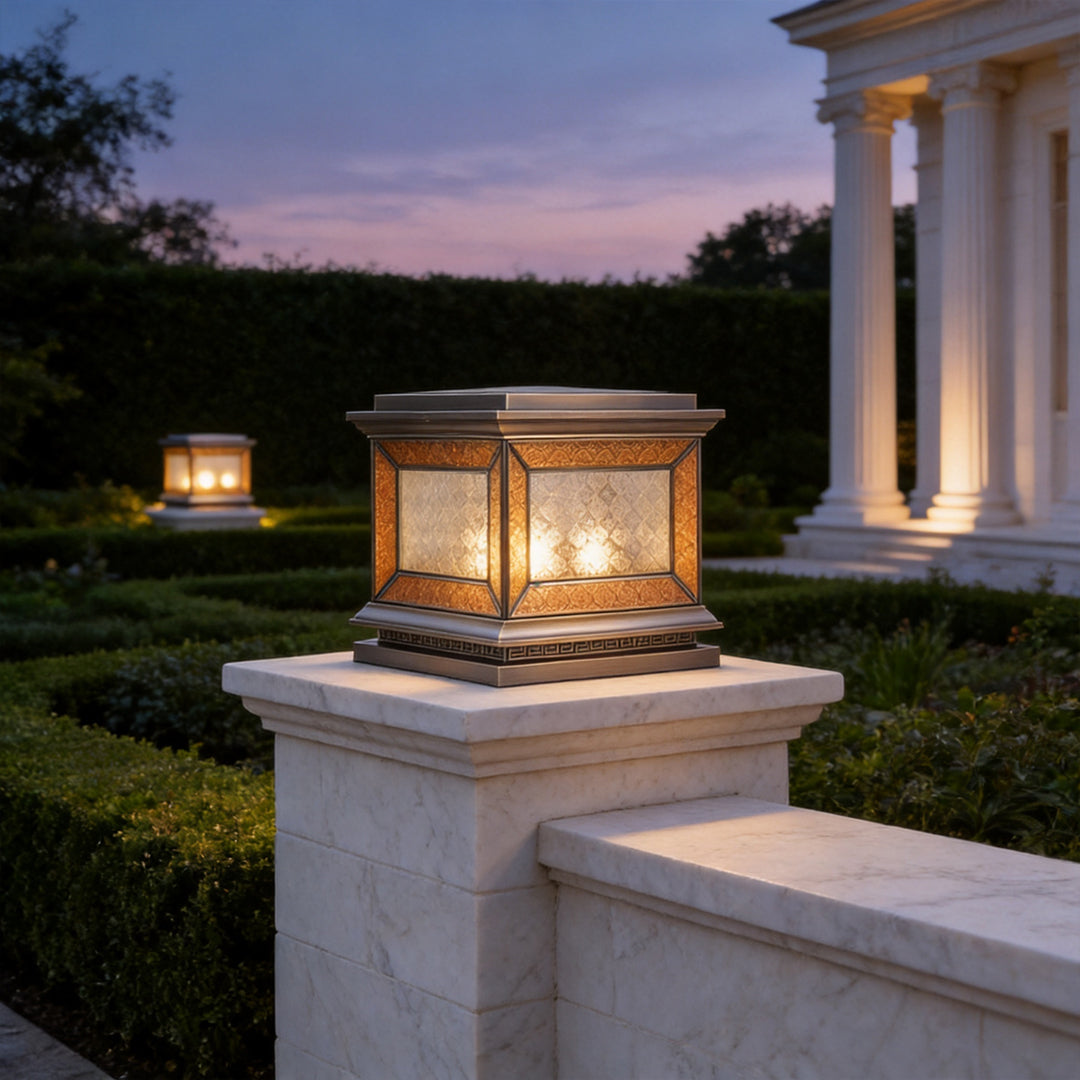 Decorative solar lights pillar placed on outdoor stone wall with warm evening illumination.