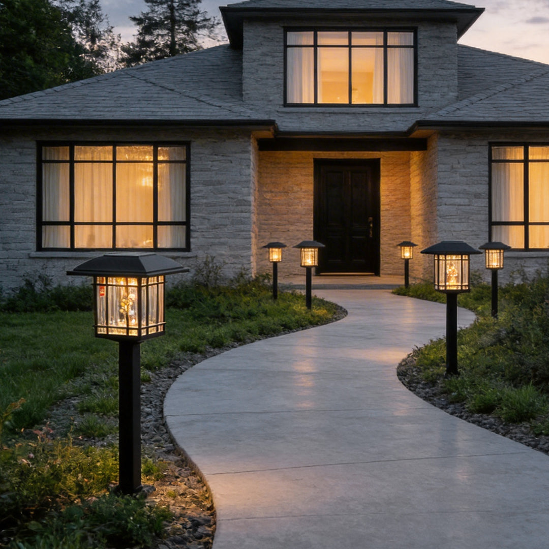 Vintage black solar path lights for a front walkway entrance