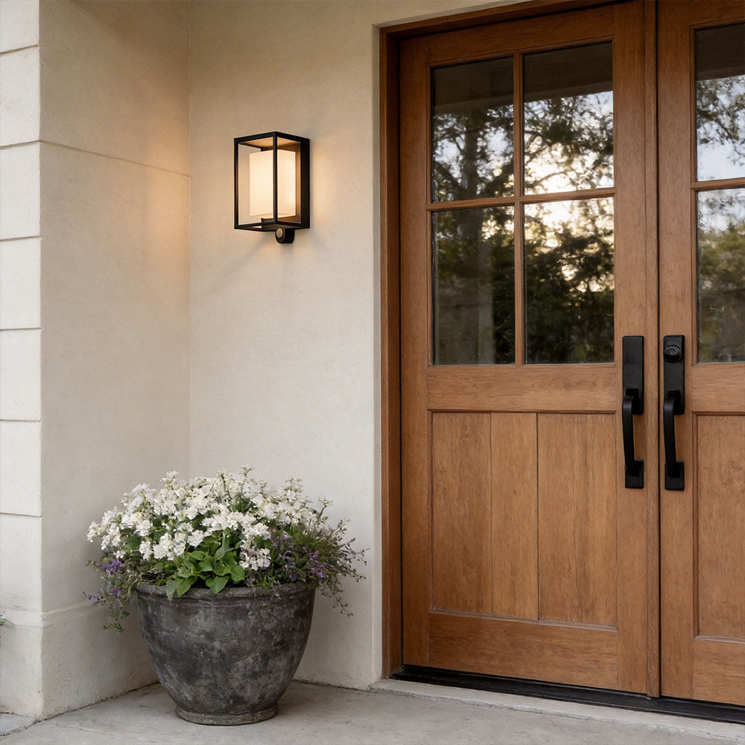 Close-up of solar outdoor wall mounted lights showcasing its rectangular design and warm light.