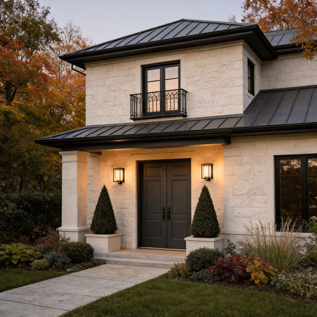 Solar outdoor wall mounted lights with a contemporary design, providing warm illumination near a front door.