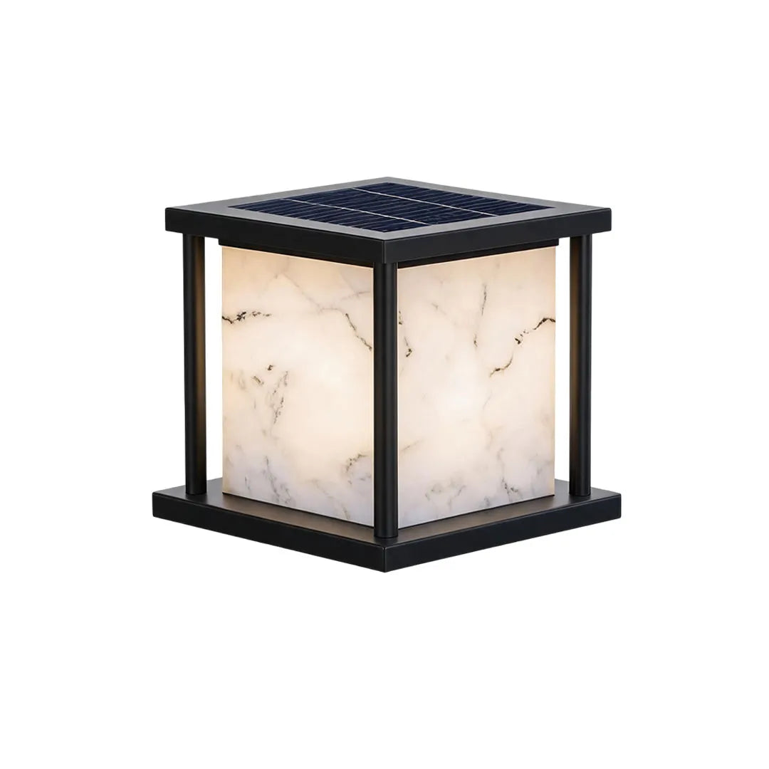 Outdoor pillar solar lights with an integrated solar panel and marble-effect diffuser.