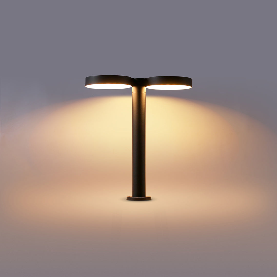 Solar path light mounted in a garden, offering functional and decorative illumination.