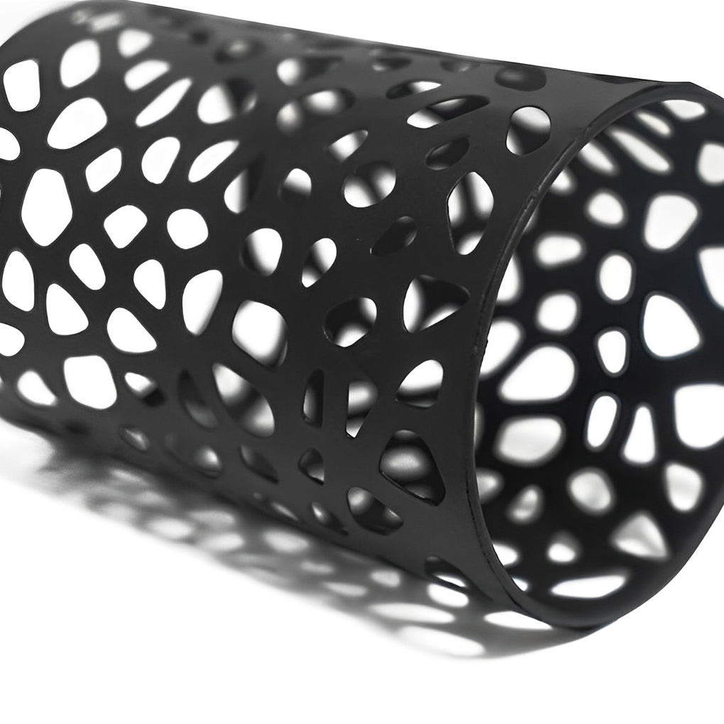 Close-up of solar path lighting LED metal lampshade with perforated design.