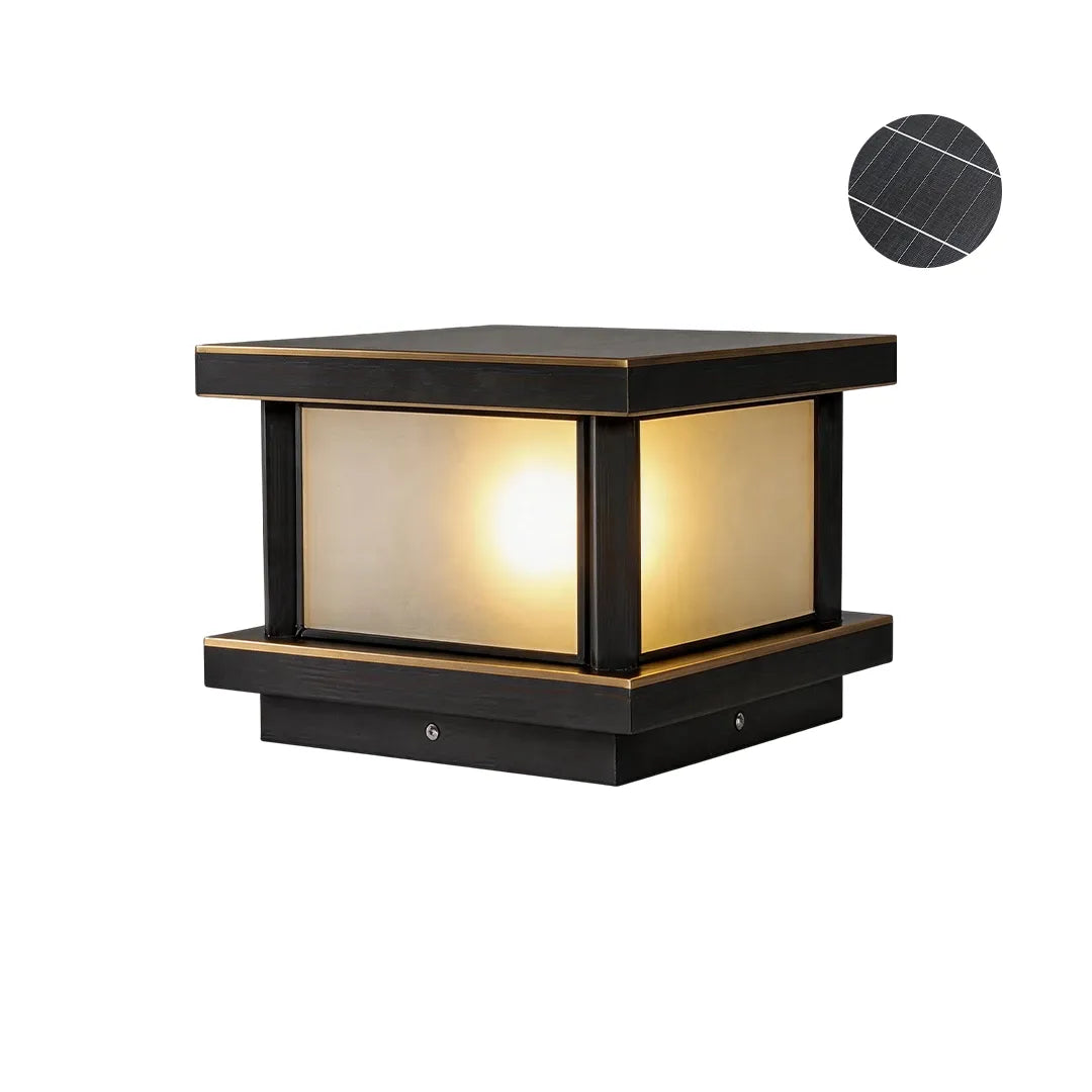 Solar pillar light with dark bronze frame warm glow and integrated solar panel