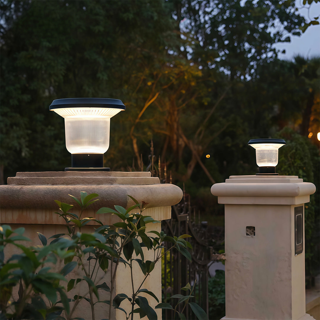 Solar-powered pillar light mounted on a garden post, enhancing the yard's nighttime atmosphere.
