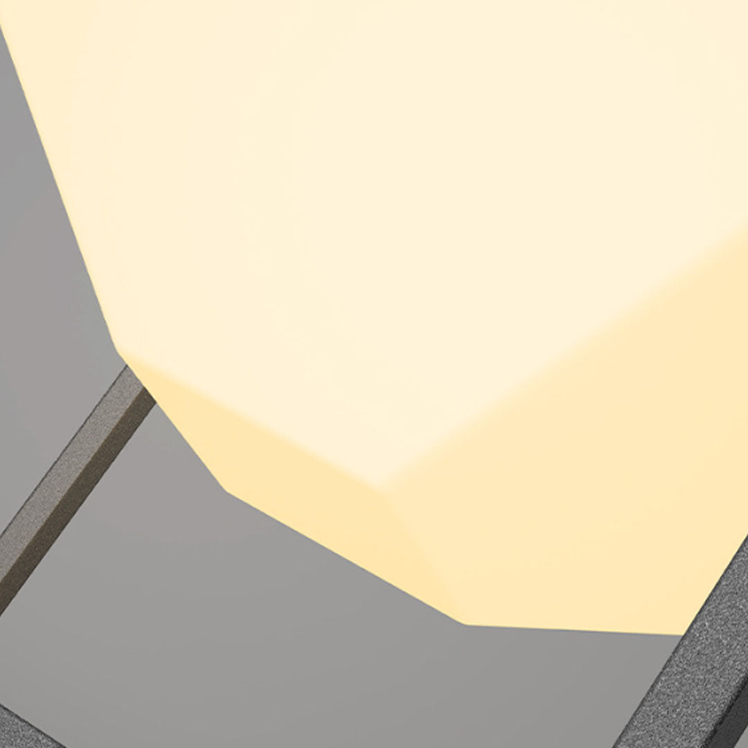 Top solar panel detail of solar pillar light outdoor with integrated energy-saving technology.
