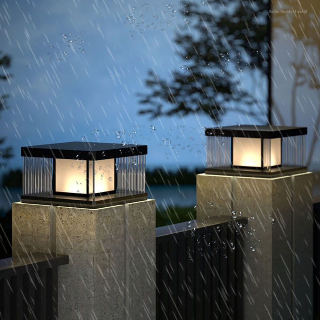 Solar pillar lights providing ambient light near a poolside area.