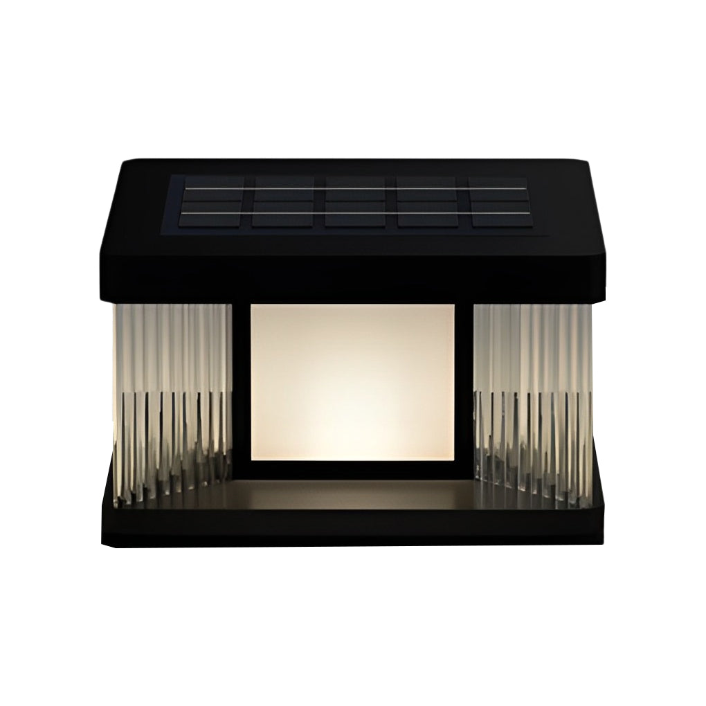 Solar pillar lights with a close-up of their illuminated pattern at night.