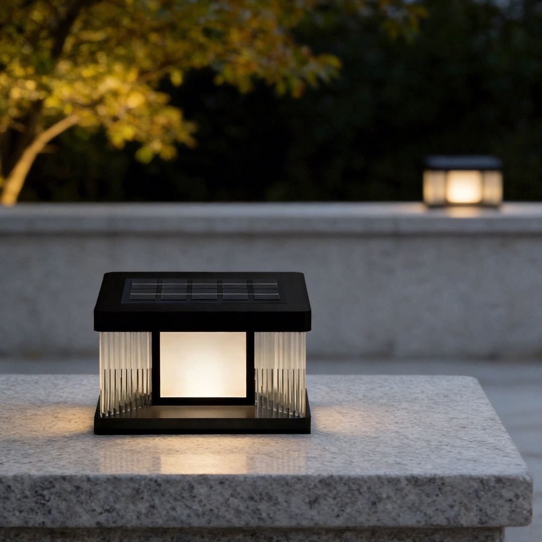 Solar pillar lights with a close-up of their illuminated vertical slats.