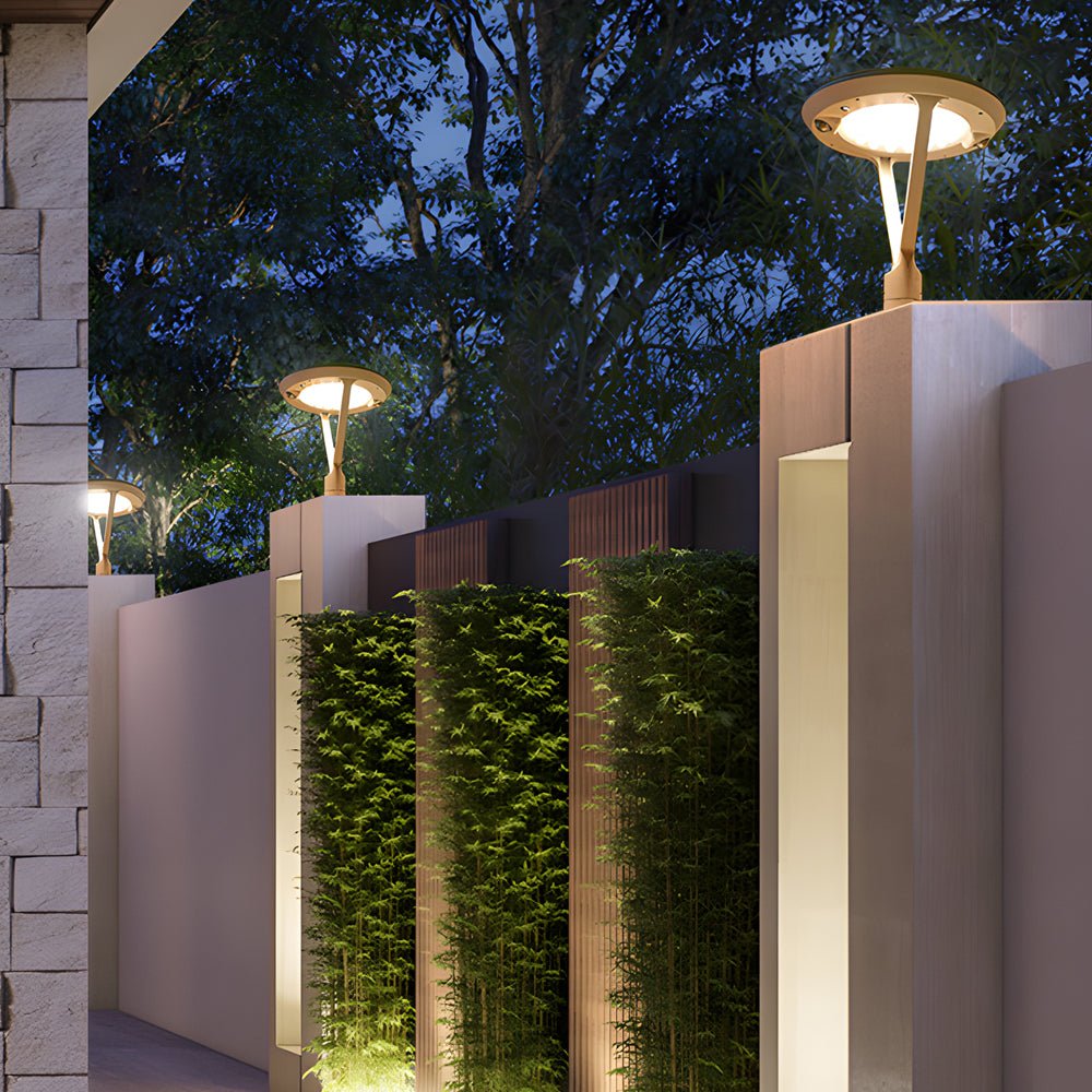 Solar pillar lights with a close-up of their triangular light structure.