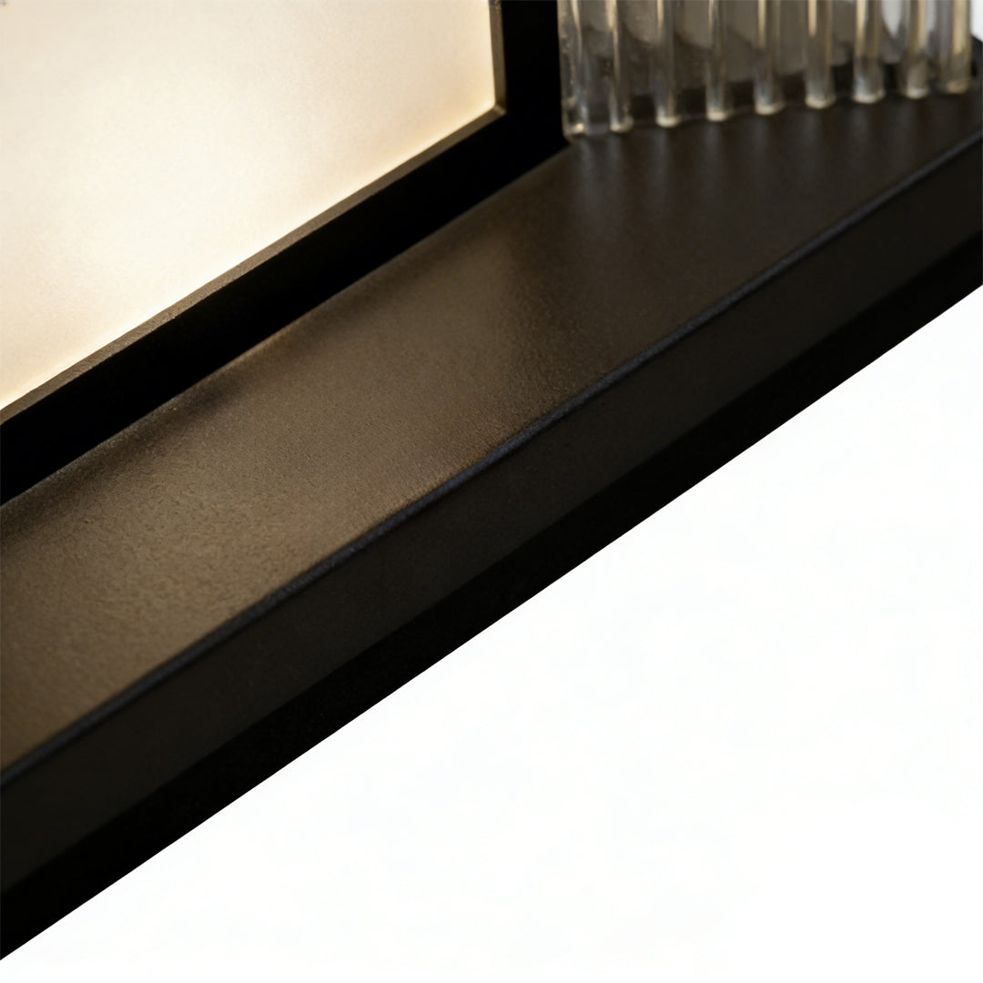 Solar pillar lights with a modern design, providing soft illumination in a garden.