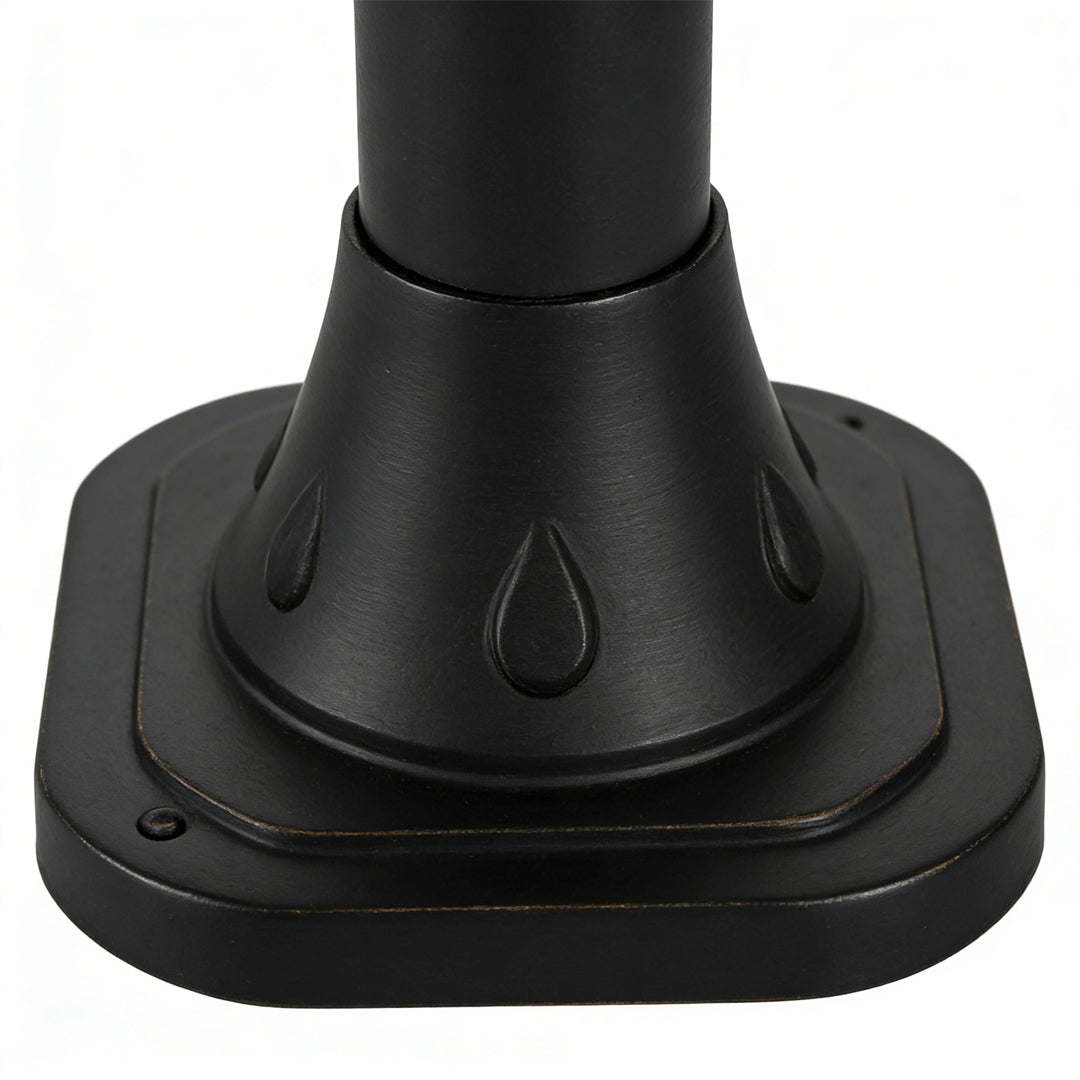 Close-up of a solar powered lawn light base, showcasing its durable and weatherproof design.