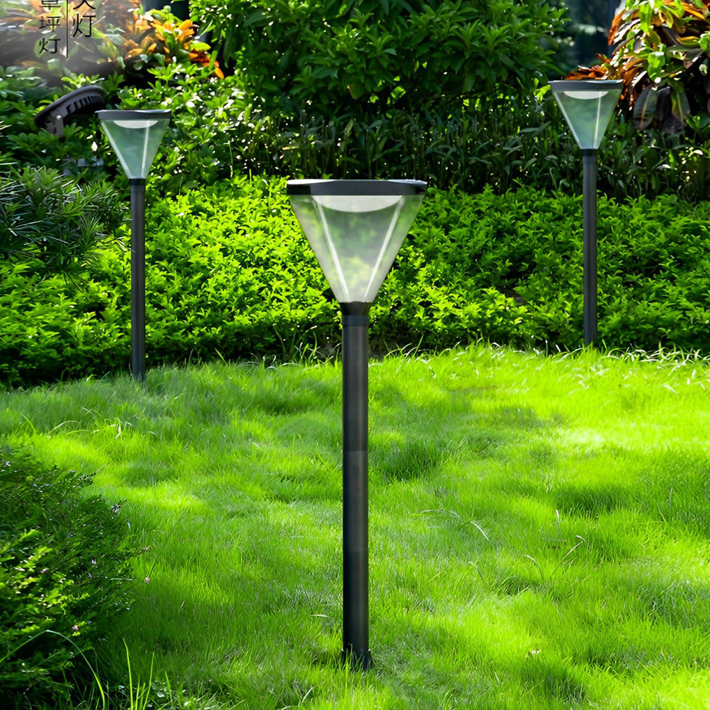 Solar powered lawn light with a contemporary design, enhancing a well-manicured lawn.