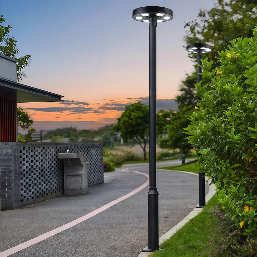 Street lighting fixture with integrated solar panel, brightening the outdoor path.