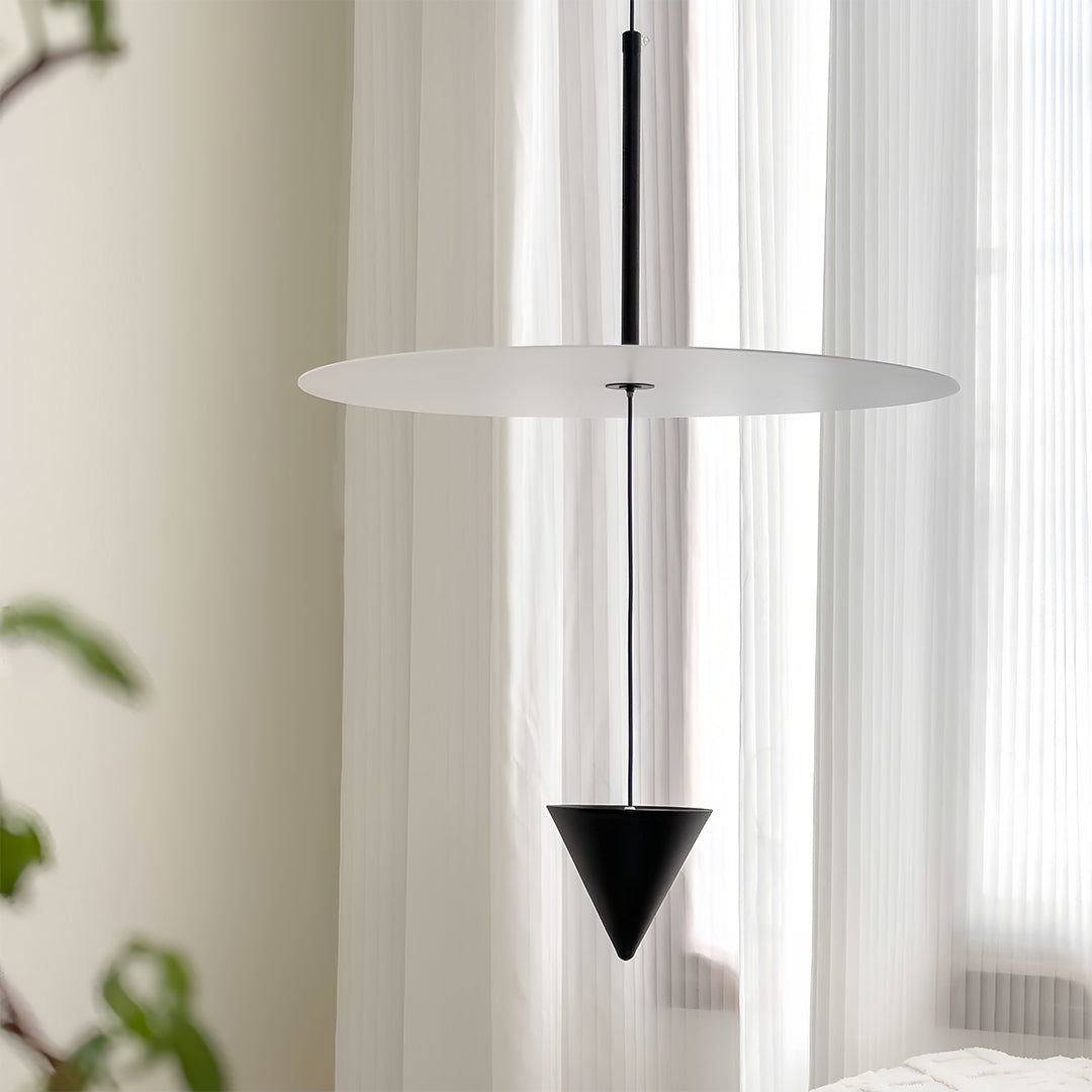 Sophisticated 1 light pendant cluster creating dramatic lighting design in contemporary dining area