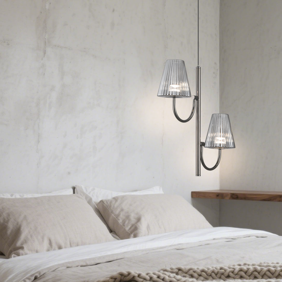 Sophisticated bedroom lighting featuring minimalist-pendant light with pleated shade in dark contemporary setting
