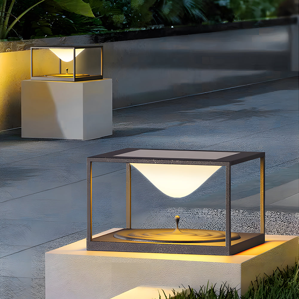 Silver Metal Table Lamp pillar post lights creating sophisticated outdoor lighting design on modern concrete steps