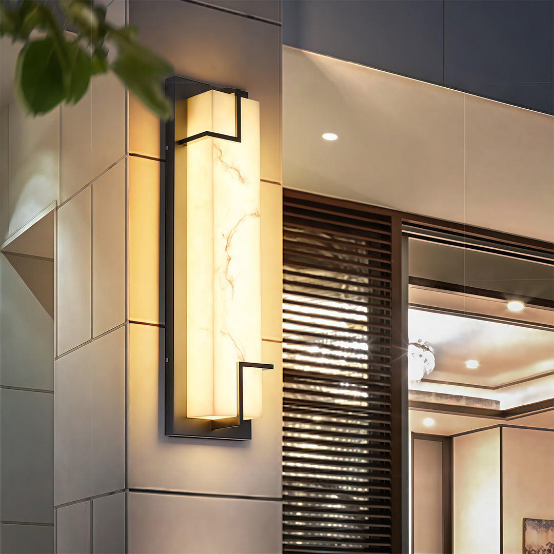 Sophisticated exterior wall lights black with glass shade chandelier influence illuminating contemporary home entrance at twilight.