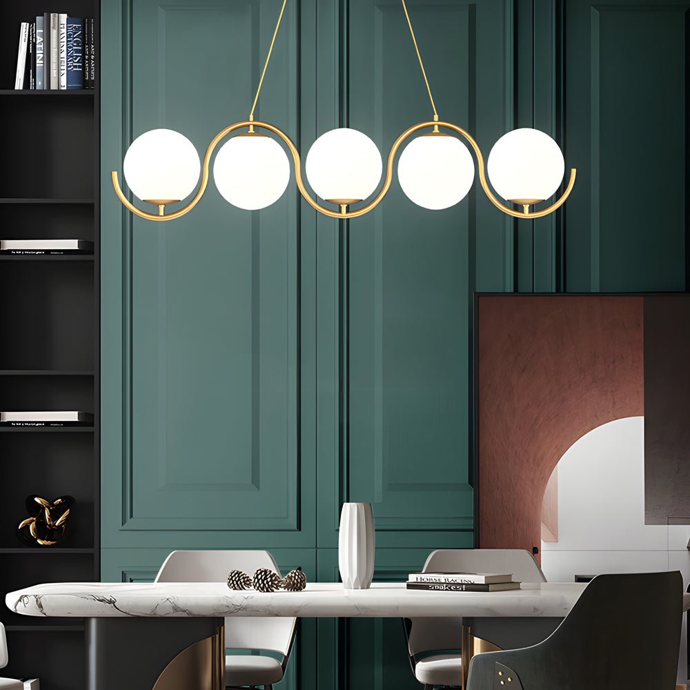 Sophisticated glass ball linear chandelier with clear glass orbs, perfect for contemporary interiors.