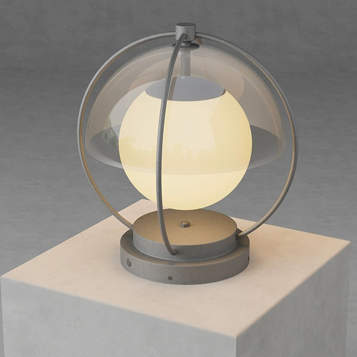Sophisticated globe light with metallic finish providing warm accent lighting for contemporary spaces