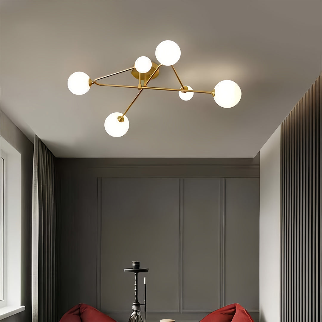 Sophisticated gold semi flush mount light creating statement lighting in minimalist living space