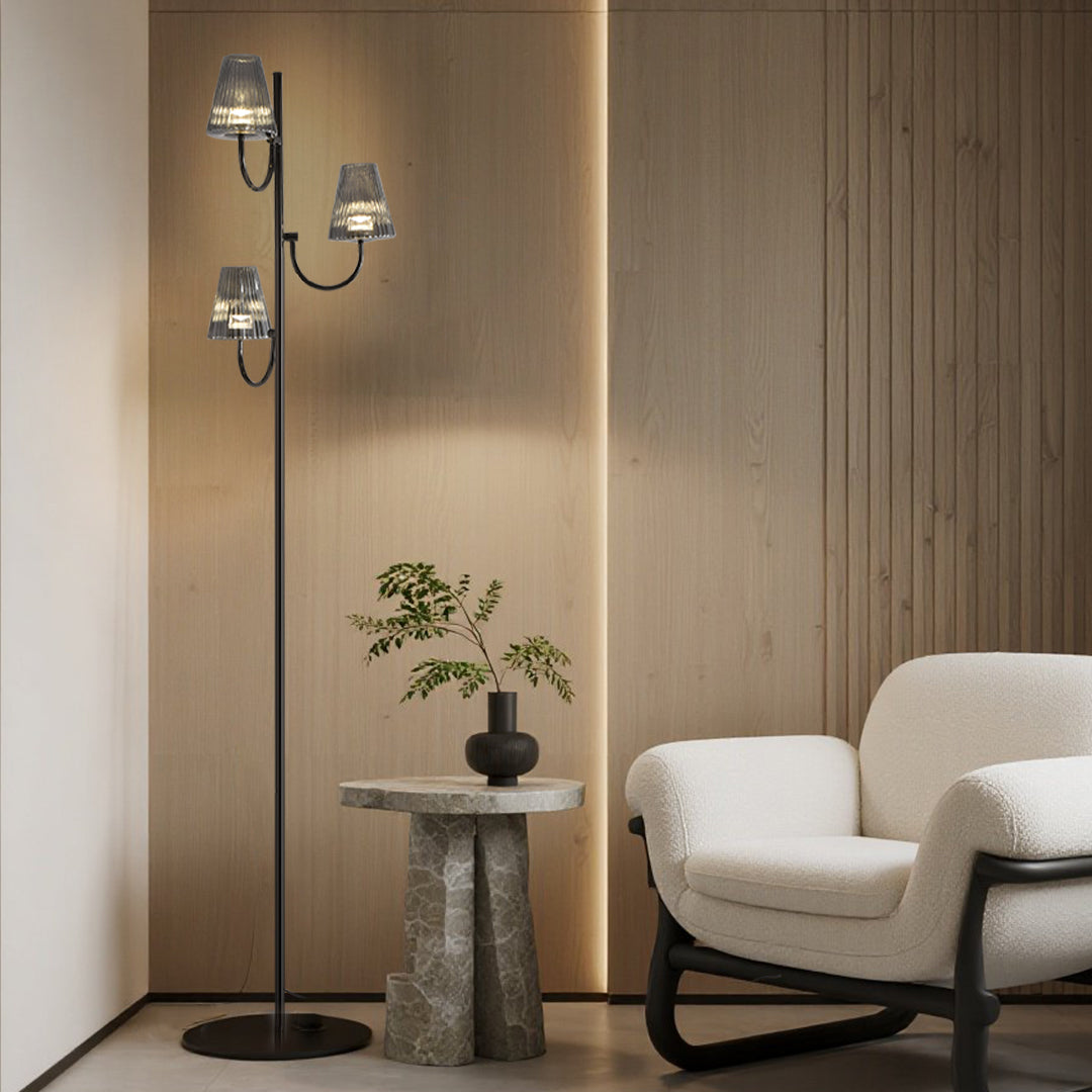 Sophisticated interior lighting with multi-arm floor lamp complementing neutral modern furnishings