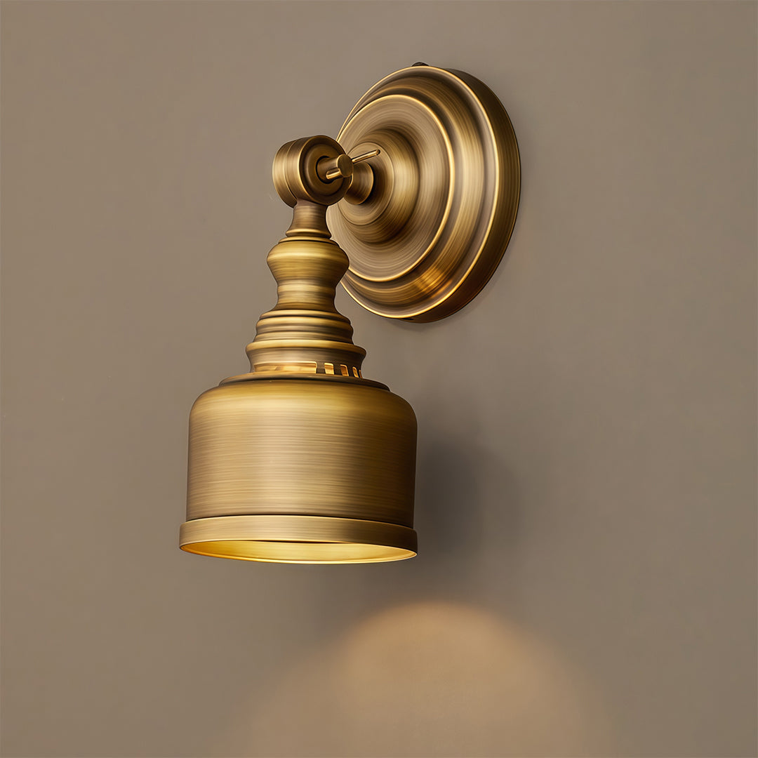 Sophisticated LED wall light lamp with glass shade chandelier design in solid brass finish with decorative ridged detailing.