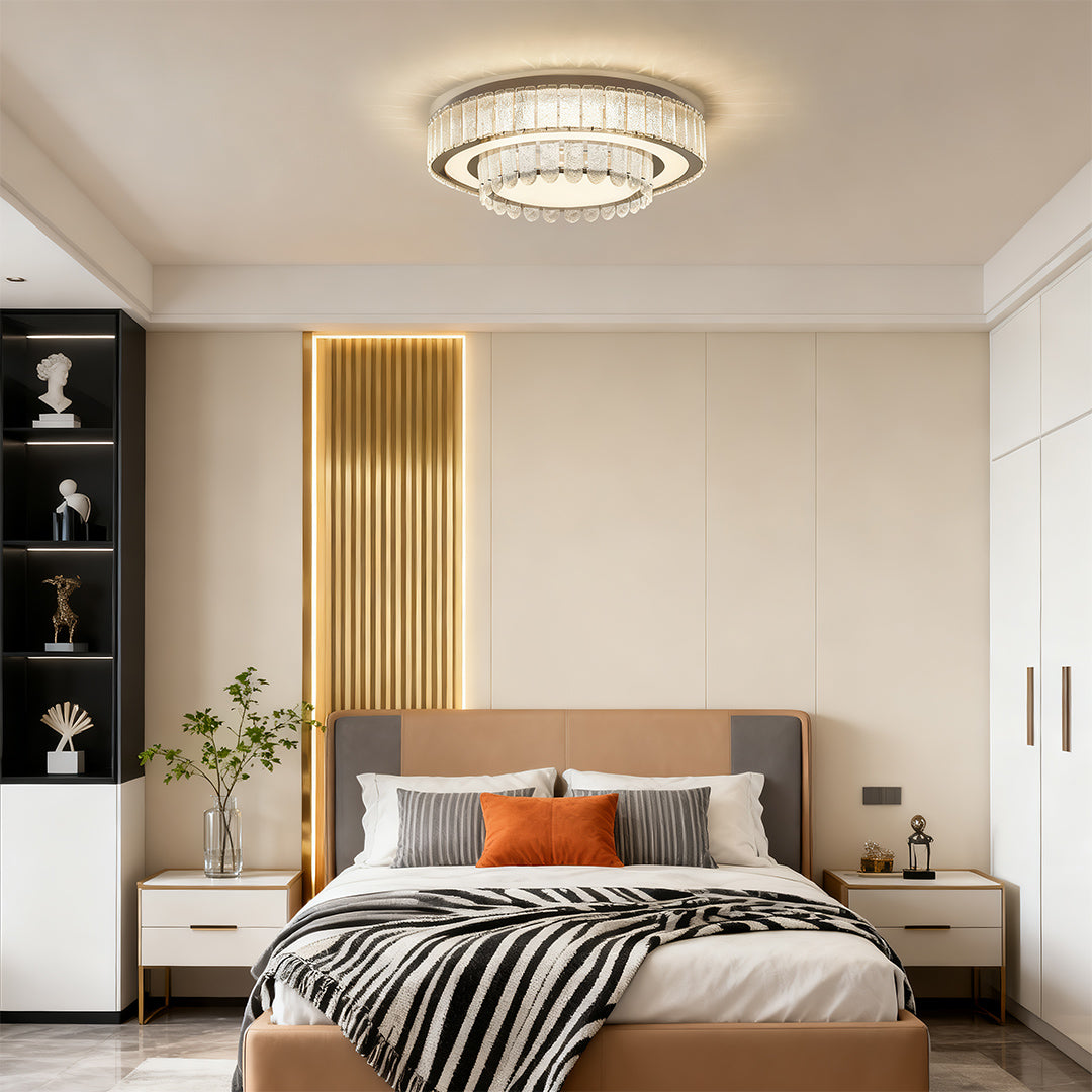 Sophisticated modern flush mount light fixtures featuring glass shade chandelier influence in minimalist neutral bedroom setting.