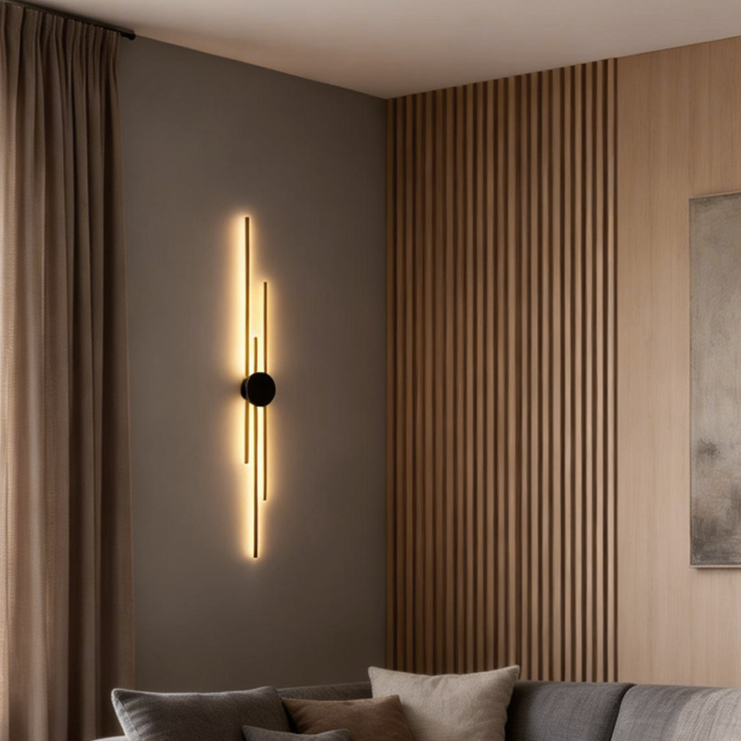 Sophisticated modern linear wall sconce in black and gold, providing ambient lighting that complements modern home decor.