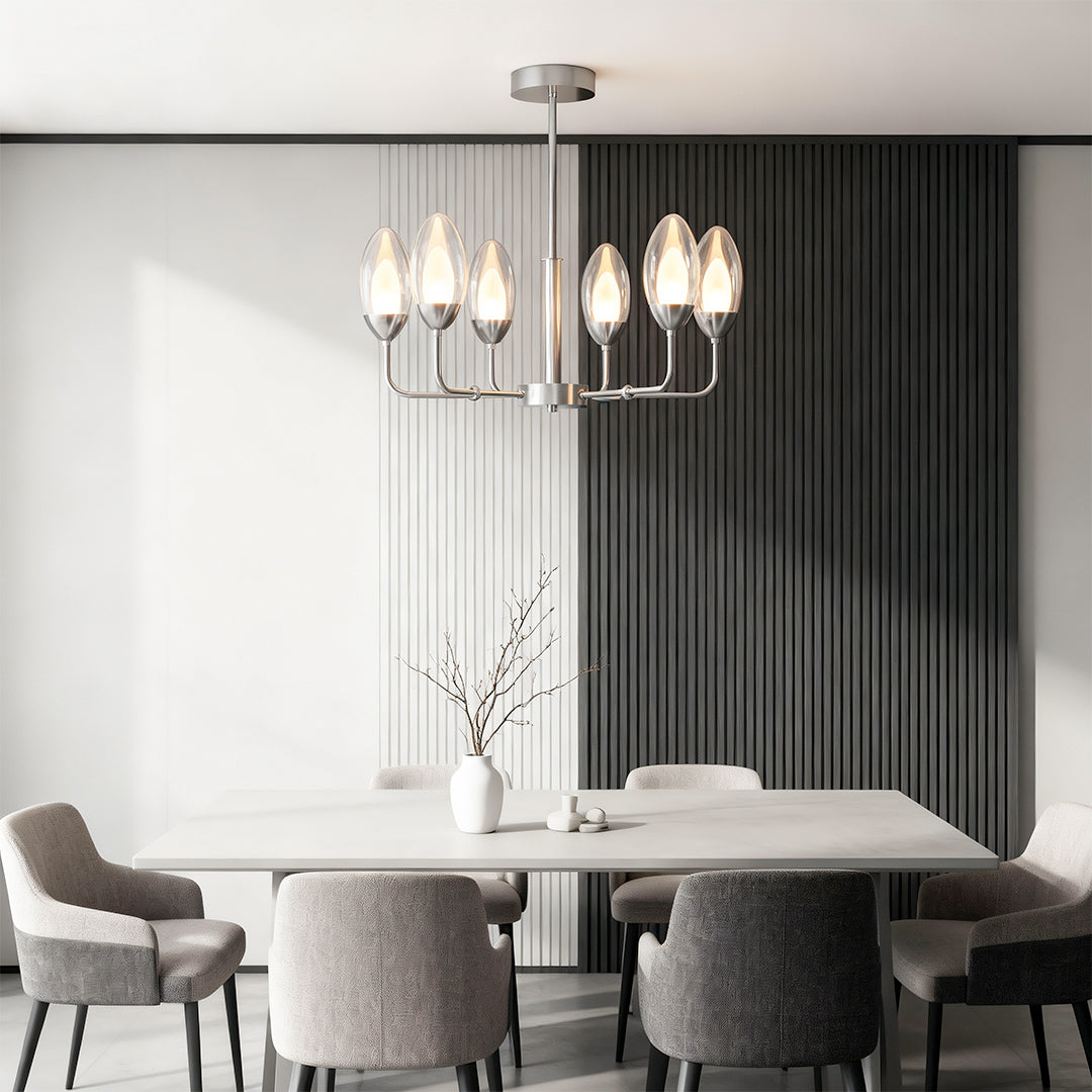 Sophisticated modern minimalist chandelier featuring glass shade chandelier styling providing ambient lighting in gray-toned dining space.