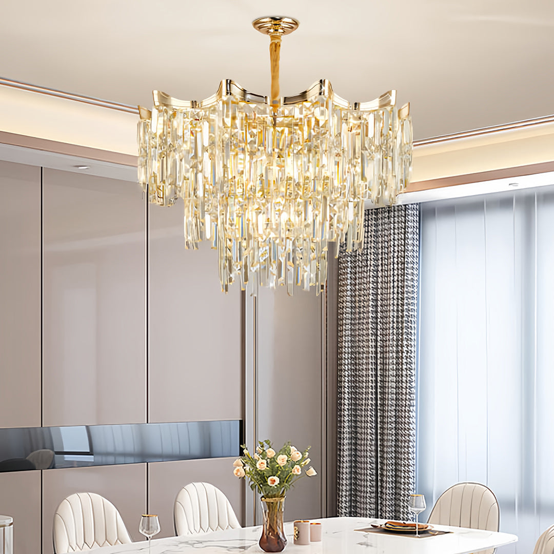 Sophisticated tiered glass chandelier installed in elegant living room with neutral contemporary decor