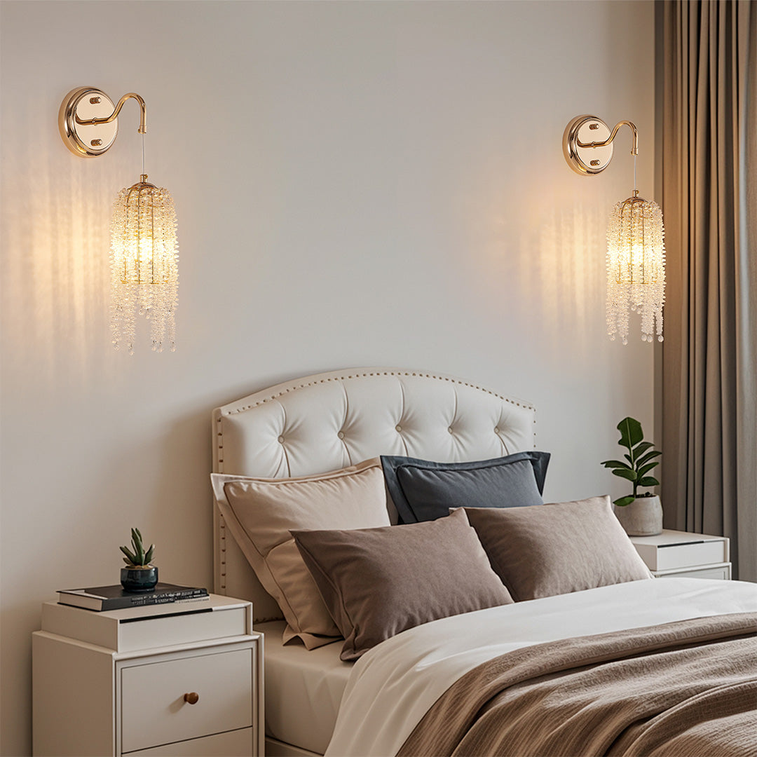 Sophisticated wall lights with crystals and glass shade chandelier influence illuminating bedroom nightstands with warm ambient lighting.